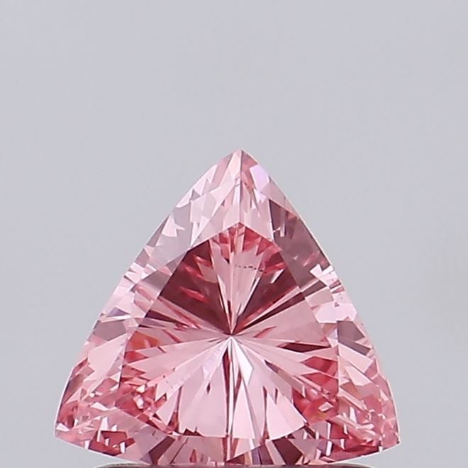 Loose Diamond - TRIANGULAR 0.57ct Fancy Vivid Pink VS2: Loose Diamond - TRIANGULAR 0.57ct Fancy Vivid Pink VS2 Source: This is a real non-mined Diamond that has been grown in a lab Shape: TRIANGULAR Carats: 0.57 Color: Fancy Vivid Pink Certification: NONE 