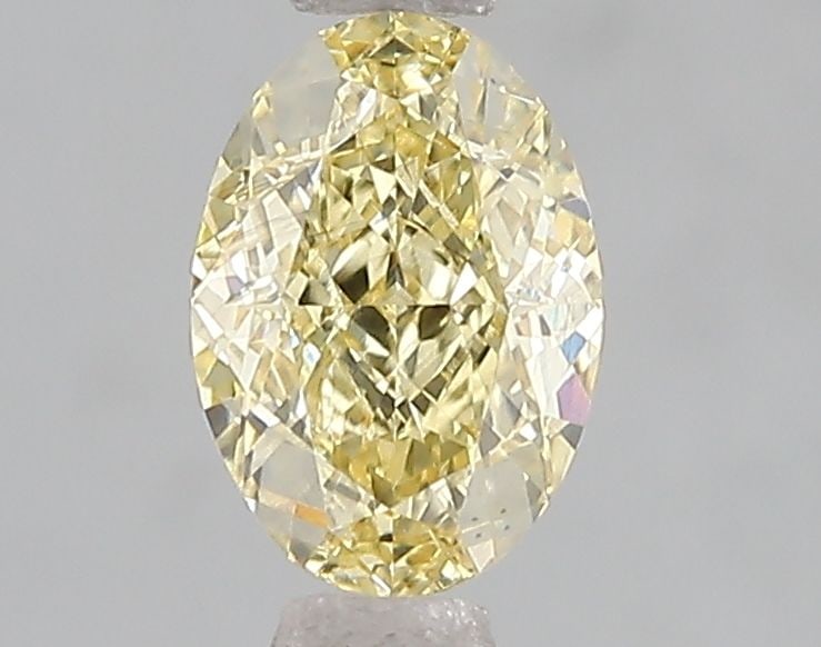 Loose Diamond - OVAL 1.09ct Fancy Intense Yellow VS2: Loose Diamond - OVAL 1.09ct Fancy Intense Yellow VS2 Source: This is a real non-mined Diamond that has been grown in a lab Shape: OVAL Carats: 1.09 Color: Fancy Intense Yellow Certification: IGI Video