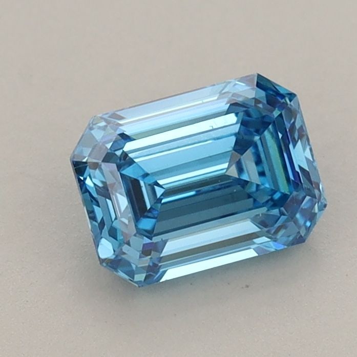 Loose Diamond - EMERALD 0.95ct Fancy Vivid Blue VS2: Loose Diamond - EMERALD 0.95ct Fancy Vivid Blue VS2 Source: This is a real non-mined Diamond that has been grown in a lab Shape: EMERALD Carats: 0.95 Color: Fancy Vivid Blue Certification: IGI Video: