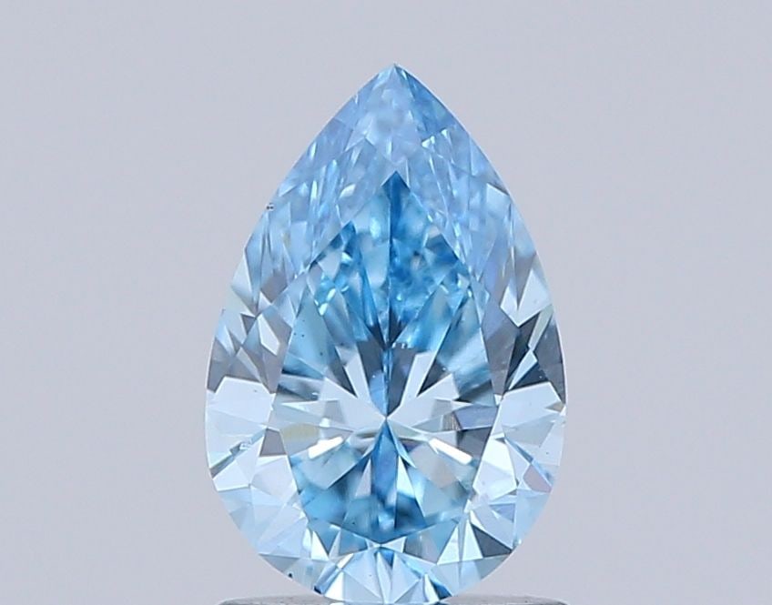 Loose Diamond - PEAR 1.02ct Fancy Vivid Blue VS1: Loose Diamond - PEAR 1.02ct Fancy Vivid Blue VS1 Source: This is a real non-mined Diamond that has been grown in a lab Shape: PEAR Carats: 1.02 Color: Fancy Vivid Blue Certification: NONE Video: