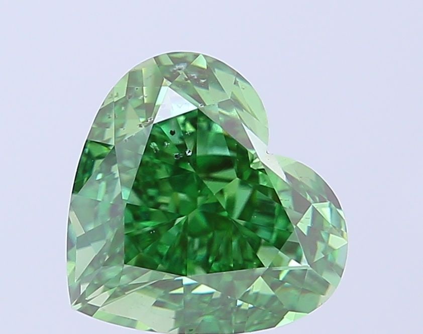 Loose Diamond - HEART 5.06ct Fancy Vivid Green SI1: Loose Diamond - HEART 5.06ct Fancy Vivid Green SI1 Source: This is a real non-mined Diamond that has been grown in a lab Shape: HEART Carats: 5.06 Color: Fancy Vivid Green Certification: IGI Video: