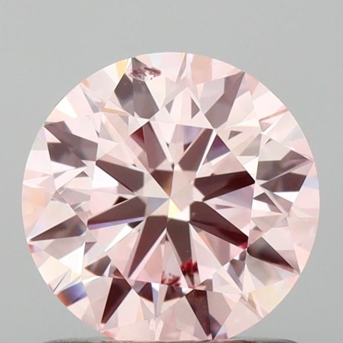 Ideal Loose Diamond - ROUND 0.97ct Fancy Intense Pink SI1: Ideal Loose Diamond - ROUND 0.97ct Fancy Intense Pink SI1 Source: This is a real non-mined Diamond that has been grown in a lab Shape: ROUND Carats: 0.97 Color: Fancy Intense Pink Certification: IGI V
