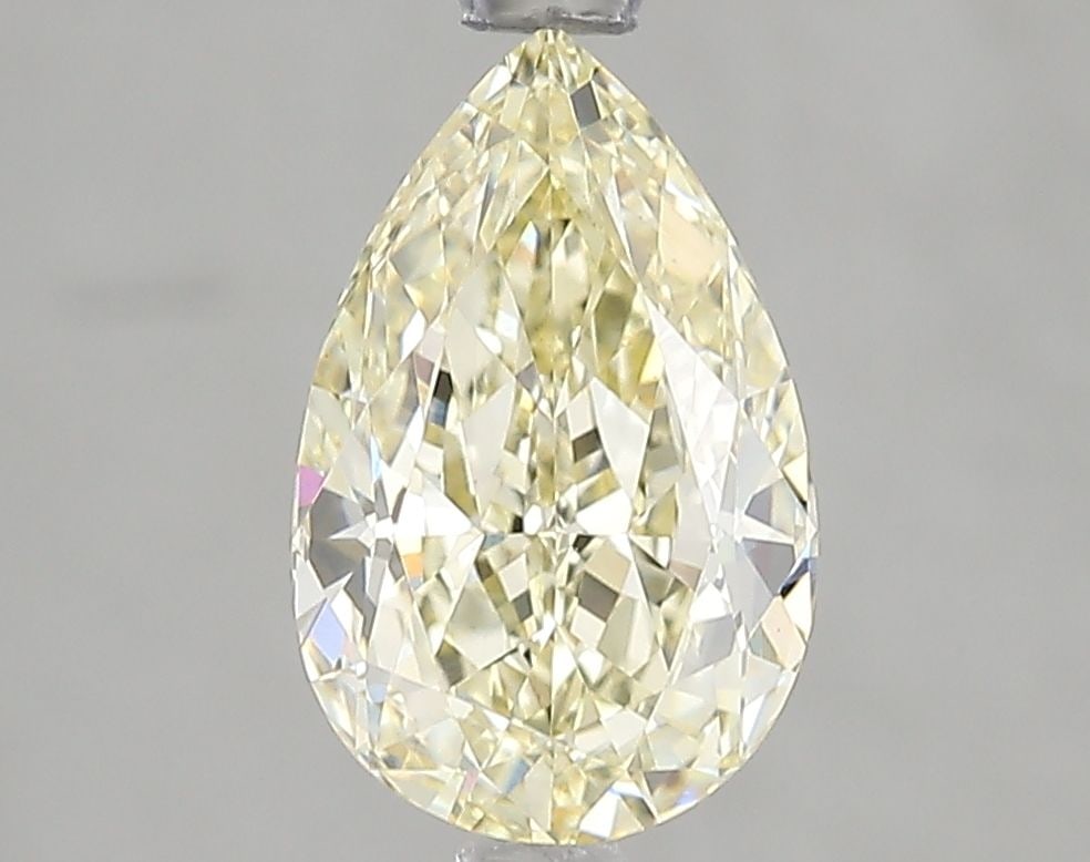 Loose Diamond - PEAR 2.08ct Fancy Yellow VS1: Loose Diamond - PEAR 2.08ct Fancy Yellow VS1 Source: This is a real non-mined Diamond that has been grown in a lab Shape: PEAR Carats: 2.08 Color: Fancy Yellow Certification: IGI Video: