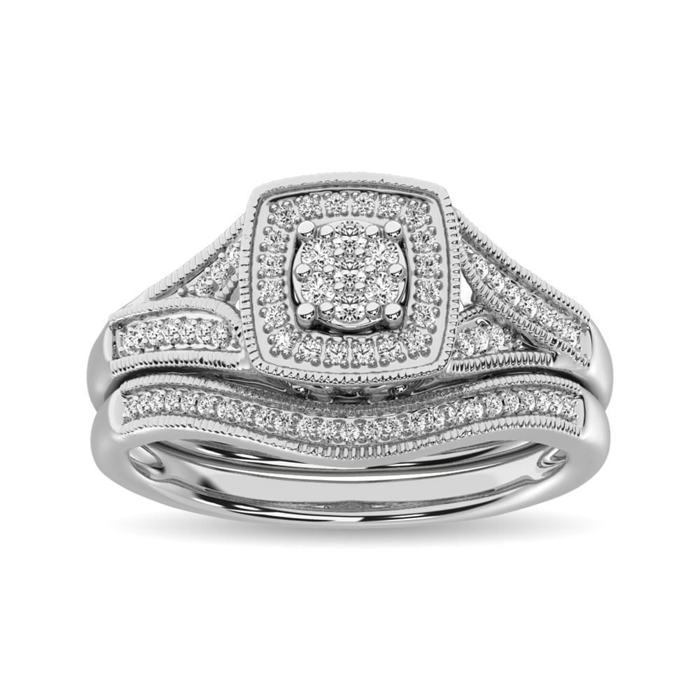 Diamond Bridal Ring 1/6 Ct.tw in Round-cut 10K in White Gold: Diamond Bridal Ring 1/6 Ct.tw in Round-cut 10K in White Gold A brilliant round center diamond is framed by additional round diamonds in this captivating ring in 10K white gold. The matching Wedding ba