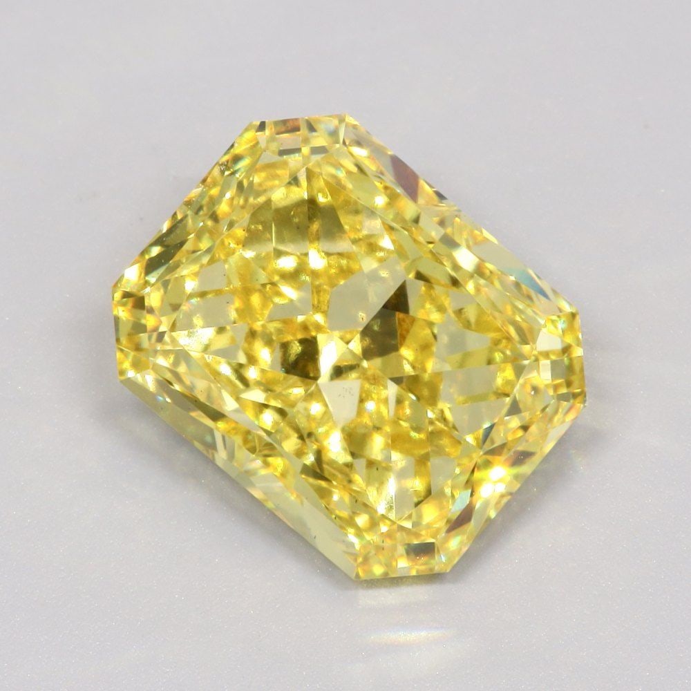 Loose Diamond - RADIANT 6.53ct Fancy Vivid Yellow VS2: Loose Diamond - RADIANT 6.53ct Fancy Vivid Yellow VS2 Source: This is a real non-mined Diamond that has been grown in a lab Shape: RADIANT Carats: 6.53 Color: Fancy Vivid Yellow Certification: IGI Vid
