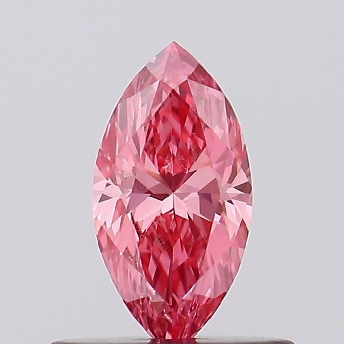 Loose Diamond - MARQUISE 0.39ct Fancy Vivid Pink VS1: Loose Diamond - MARQUISE 0.39ct Fancy Vivid Pink VS1 Source: This is a real non-mined Diamond that has been grown in a lab Shape: MARQUISE Carats: 0.39 Color: Fancy Vivid Pink Certification: IGI Video