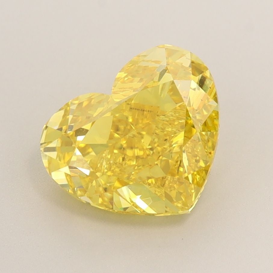 Loose Diamond - HEART 2.51ct Fancy Vivid Yellow VS1: Loose Diamond - HEART 2.51ct Fancy Vivid Yellow VS1 Source: This is a real non-mined Diamond that has been grown in a lab Shape: HEART Carats: 2.51 Color: Fancy Vivid Yellow Certification: IGI Video:
