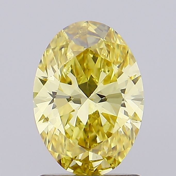 Loose Diamond - OVAL 1.06ct Fancy Intense Yellow VS1: Loose Diamond - OVAL 1.06ct Fancy Intense Yellow VS1 Source: This is a real non-mined Diamond that has been grown in a lab Shape: OVAL Carats: 1.06 Color: Fancy Intense Yellow Certification: IGI Video