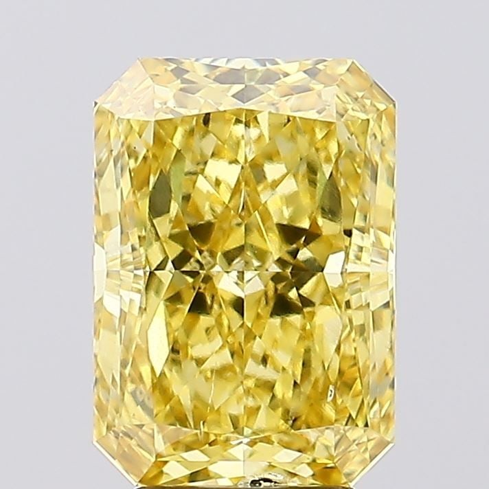 Loose Diamond - RADIANT 3.82ct Fancy Vivid Yellow SI1: Loose Diamond - RADIANT 3.82ct Fancy Vivid Yellow SI1 Source: This is a real non-mined Diamond that has been grown in a lab Shape: RADIANT Carats: 3.82 Color: Fancy Vivid Yellow Certification: IGI Vid