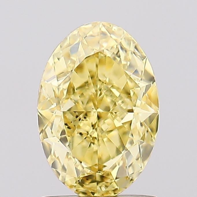 Loose Diamond - OVAL 1.53ct Fancy Vivid Yellow VS2: Loose Diamond - OVAL 1.53ct Fancy Vivid Yellow VS2 Source: This is a real non-mined Diamond that has been grown in a lab Shape: OVAL Carats: 1.53 Color: Fancy Vivid Yellow Certification: IGI Video:
