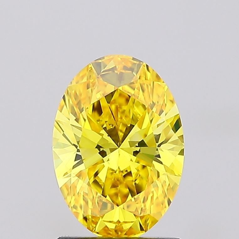 Loose Diamond - OVAL 1.27ct Fancy Vivid Yellow VS1: Loose Diamond - OVAL 1.27ct Fancy Vivid Yellow VS1 Source: This is a real non-mined Diamond that has been grown in a lab Shape: OVAL Carats: 1.27 Color: Fancy Vivid Yellow Certification: IGI Video: