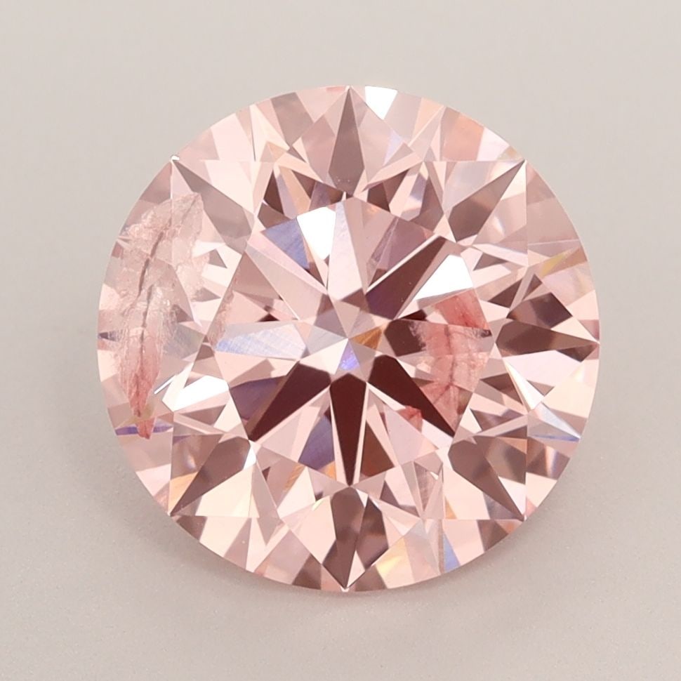 Ideal Loose Diamond - ROUND 3.05ct Fancy Intense Pink I1: Ideal Loose Diamond - ROUND 3.05ct Fancy Intense Pink I1 Source: This is a real non-mined Diamond that has been grown in a lab Shape: ROUND Carats: 3.05 Color: Fancy Intense Pink Certification: IGI Vi