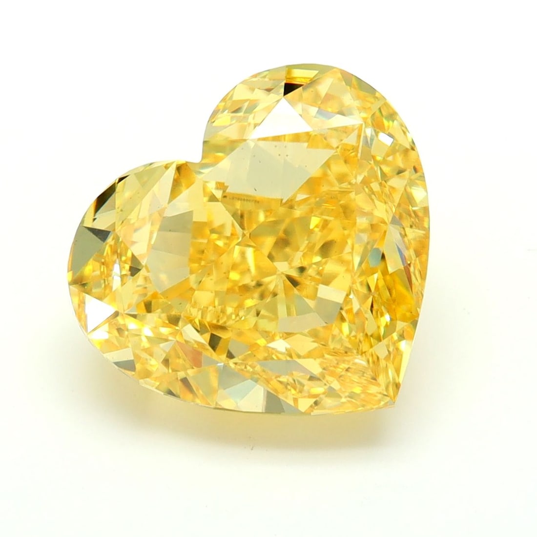 Loose Diamond - HEART 7.06ct Fancy Vivid Yellow VS1: Loose Diamond - HEART 7.06ct Fancy Vivid Yellow VS1 Source: This is a real non-mined Diamond that has been grown in a lab Shape: HEART Carats: 7.06 Color: Fancy Vivid Yellow Certification: IGI Video:
