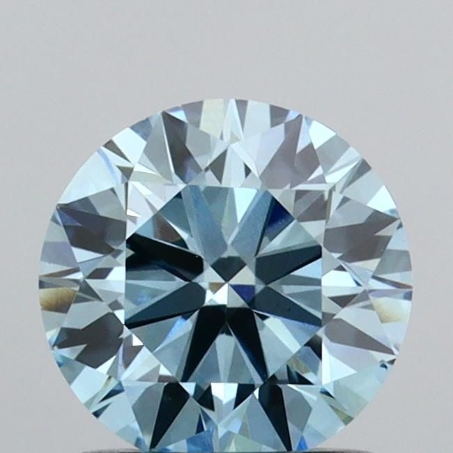 Ideal Loose Diamond - ROUND 1.0ct Fancy Vivid Blue VS2: Ideal Loose Diamond - ROUND 1.0ct Fancy Vivid Blue VS2 Source: This is a real non-mined Diamond that has been grown in a lab Shape: ROUND Carats: 1.0 Color: Fancy Vivid Blue Certification: IGI Video: