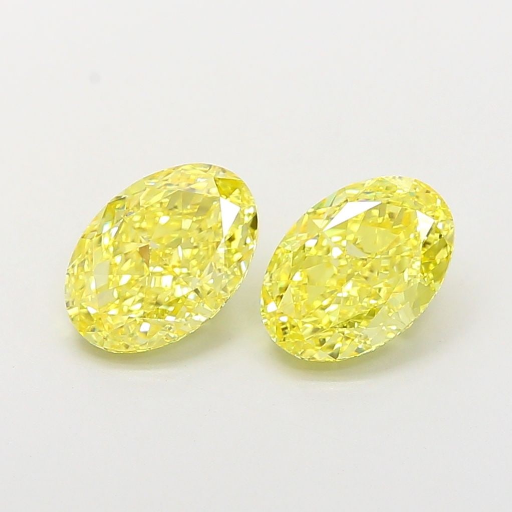 Loose Diamond - OVAL 2.02ct Fancy Vivid Yellow VVS2: Loose Diamond - OVAL 2.02ct Fancy Vivid Yellow VVS2 Source: This is a real non-mined Diamond that has been grown in a lab Shape: OVAL Carats: 2.02 Color: Fancy Vivid Yellow Certification: IGI Video: