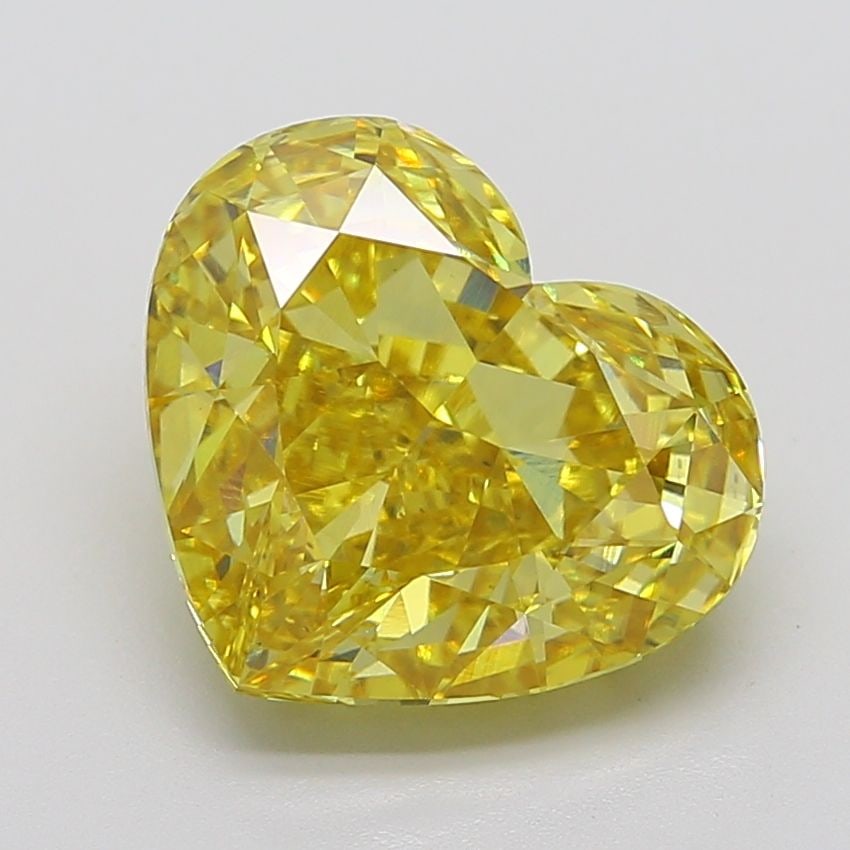 Loose Diamond - HEART 9.05ct Fancy Vivid Yellow VS1: Loose Diamond - HEART 9.05ct Fancy Vivid Yellow VS1 Source: This is a real non-mined Diamond that has been grown in a lab Shape: HEART Carats: 9.05 Color: Fancy Vivid Yellow Certification: IGI Video: