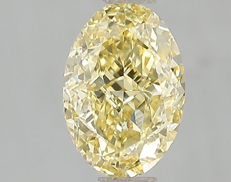 Loose Diamond - OVAL 1.51ct Fancy Vivid Yellow VS2: Loose Diamond - OVAL 1.51ct Fancy Vivid Yellow VS2 Source: This is a real non-mined Diamond that has been grown in a lab Shape: OVAL Carats: 1.51 Color: Fancy Vivid Yellow Certification: IGI Video: