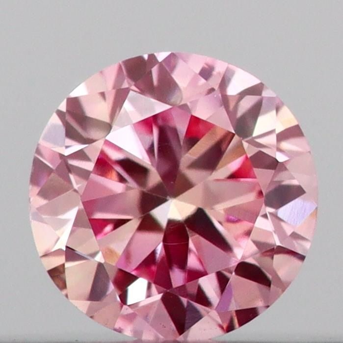 Loose Diamond - ROUND 0.16ct Fancy Vivid Pink VS1: Loose Diamond - ROUND 0.16ct Fancy Vivid Pink VS1 Source: This is a real non-mined Diamond that has been grown in a lab Shape: ROUND Carats: 0.16 Color: Fancy Vivid Pink Certification: IGI Video: