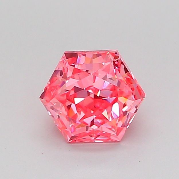 Loose Diamond - HEXAGONAL 0.89ct Fancy Vivid Pink VVS2: Loose Diamond - HEXAGONAL 0.89ct Fancy Vivid Pink VVS2 Source: This is a real non-mined Diamond that has been grown in a lab Shape: HEXAGONAL Carats: 0.89 Color: Fancy Vivid Pink Certification: IGI Vi