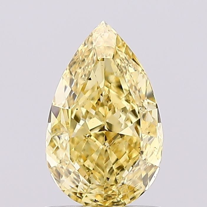 Loose Diamond - PEAR 1.04ct Fancy Vivid Yellow VS2: Loose Diamond - PEAR 1.04ct Fancy Vivid Yellow VS2 Source: This is a real non-mined Diamond that has been grown in a lab Shape: PEAR Carats: 1.04 Color: Fancy Vivid Yellow Certification: IGI Video: