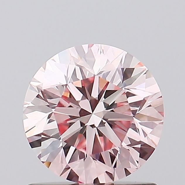 Loose Diamond - ROUND 0.98ct Fancy Light Pink VS2: Loose Diamond - ROUND 0.98ct Fancy Light Pink VS2 Source: This is a real non-mined Diamond that has been grown in a lab Shape: ROUND Carats: 0.98 Color: Fancy Light Pink Certification: IGI Video: