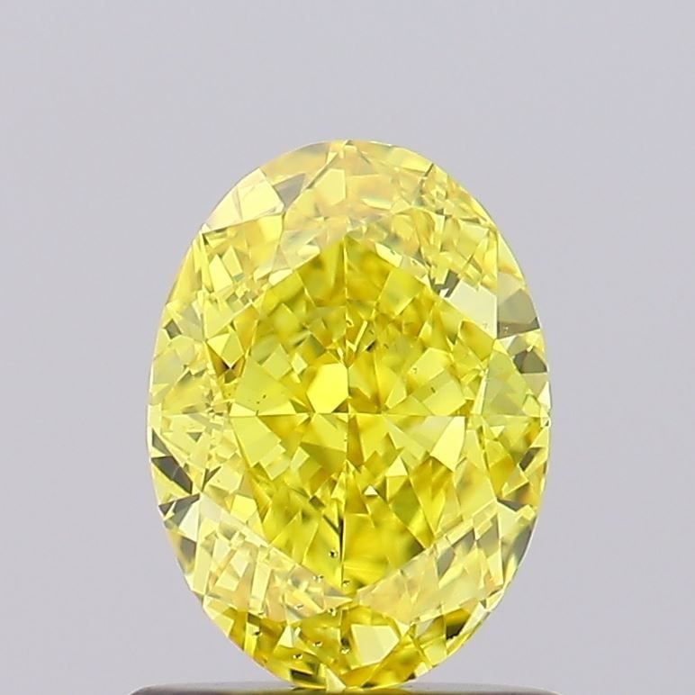 Loose Diamond - OVAL 1.03ct Fancy Intense Yellow SI1: Loose Diamond - OVAL 1.03ct Fancy Intense Yellow SI1 Source: This is a real non-mined Diamond that has been grown in a lab Shape: OVAL Carats: 1.03 Color: Fancy Intense Yellow Certification: IGI Video
