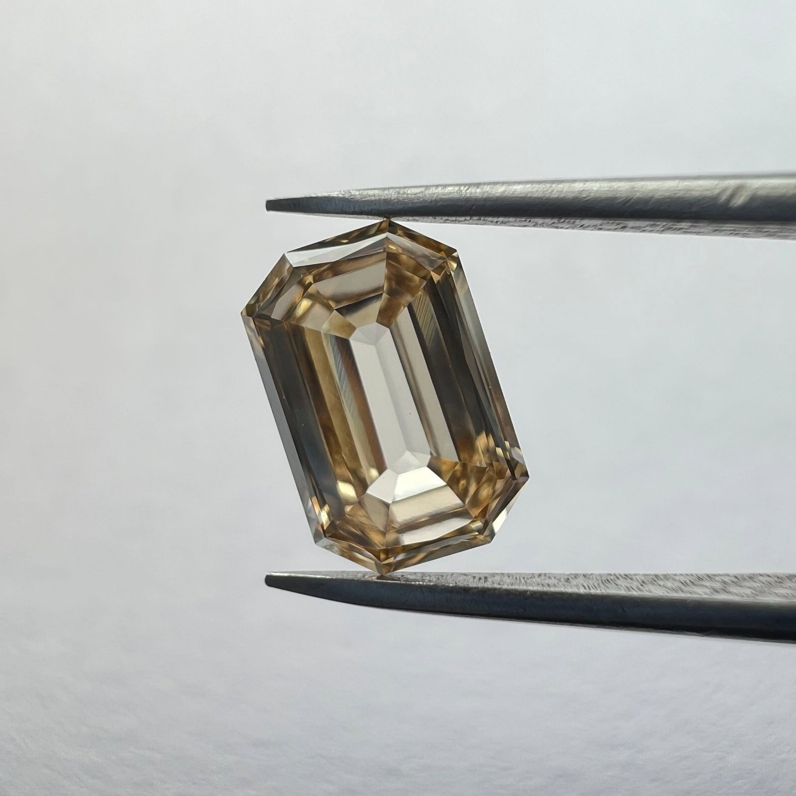 Loose Diamond - EMERALD 0.64ct Brown VVS2: Loose Diamond - EMERALD 0.64ct Brown VVS2 Source: This is a real non-mined Diamond that has been grown in a lab Shape: EMERALD Carats: 0.64 Color: Brown Certification: NONE The Diamond Depot Guarantee