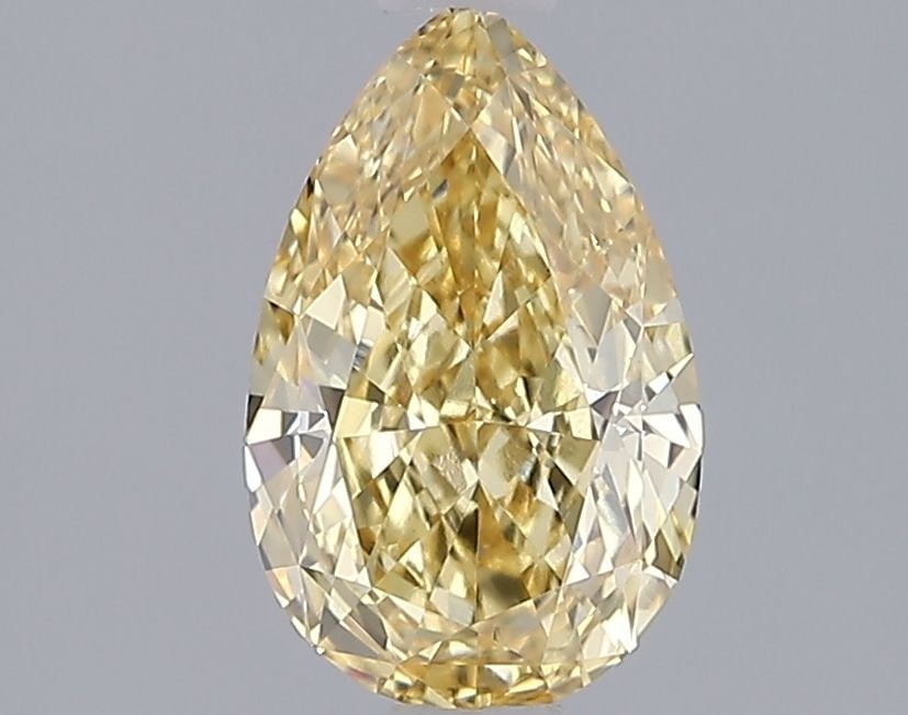 Loose Diamond - PEAR 1.59ct Fancy Vivid Yellow VS1: Loose Diamond - PEAR 1.59ct Fancy Vivid Yellow VS1 Source: This is a real non-mined Diamond that has been grown in a lab Shape: PEAR Carats: 1.59 Color: Fancy Vivid Yellow Certification: IGI Video:
