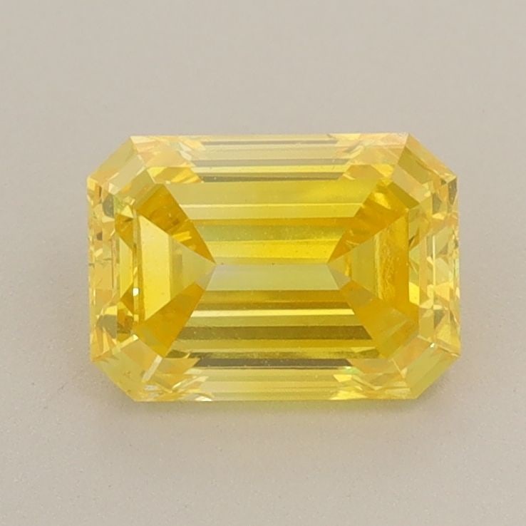 Loose Diamond - EMERALD 0.98ct Fancy Vivid Yellow VS2: Loose Diamond - EMERALD 0.98ct Fancy Vivid Yellow VS2 Source: This is a real non-mined Diamond that has been grown in a lab Shape: EMERALD Carats: 0.98 Color: Fancy Vivid Yellow Certification: IGI Vid