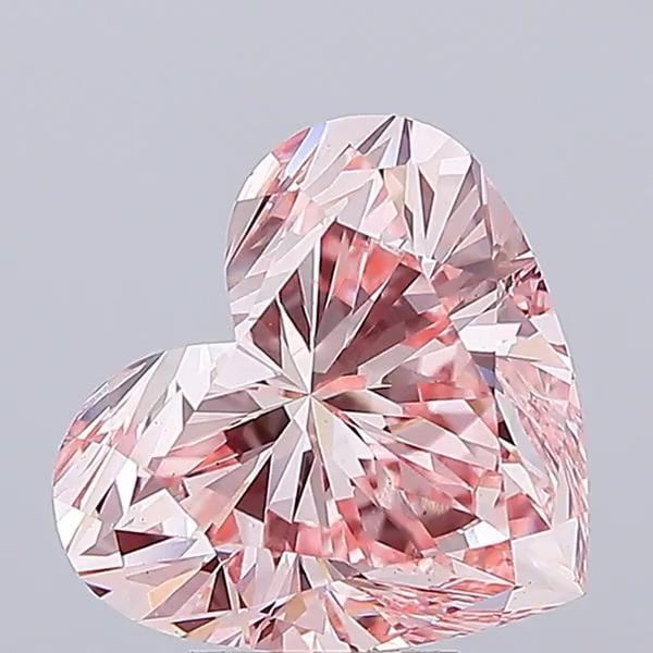 Loose Diamond - HEART 6.0ct Fancy Vivid Pink VS1: Loose Diamond - HEART 6.0ct Fancy Vivid Pink VS1 Source: This is a real non-mined Diamond that has been grown in a lab Shape: HEART Carats: 6.0 Color: Fancy Vivid Pink Certification: IGI Video: