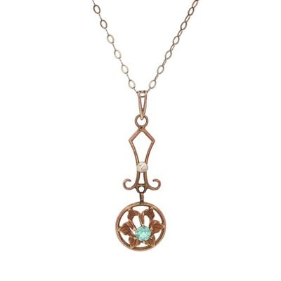 Blue Zircon Seed Pearl Flower Pendant 10k Yellow Gold Lavalier: Blue Zircon Seed Pearl Flower Pendant 10k Yellow Gold Lavalier This antique lavalier pendant is crafted from solid 10k yellow gold and features a delicate flower design. It is set with a natural old