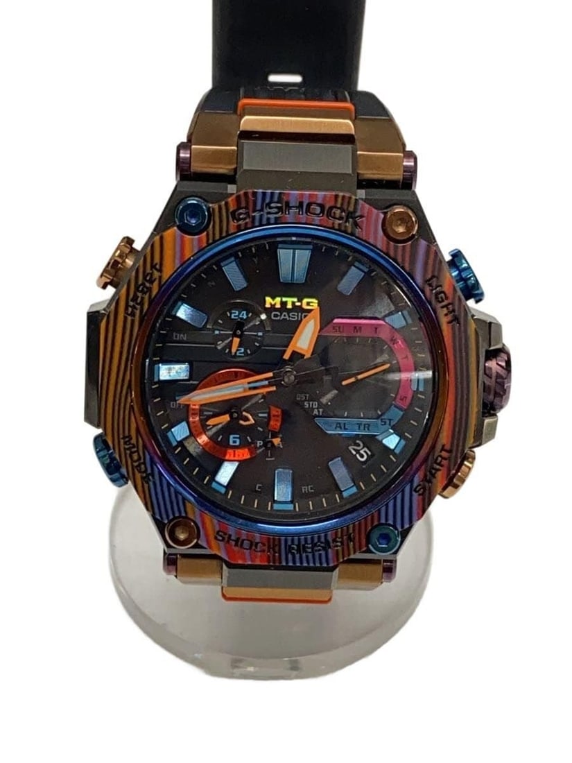 Casio G Shock MTG B2000XMG 1AJR Black Rubber Wristwatch: Casio G Shock MTG B2000XMG 1AJR Black Rubber Wristwatch This CASIO G-SHOCK MTG-B2000XMG-1AJR men's wristwatch features a black rubber band and a durable design. The watch is pre-owned and shows slight