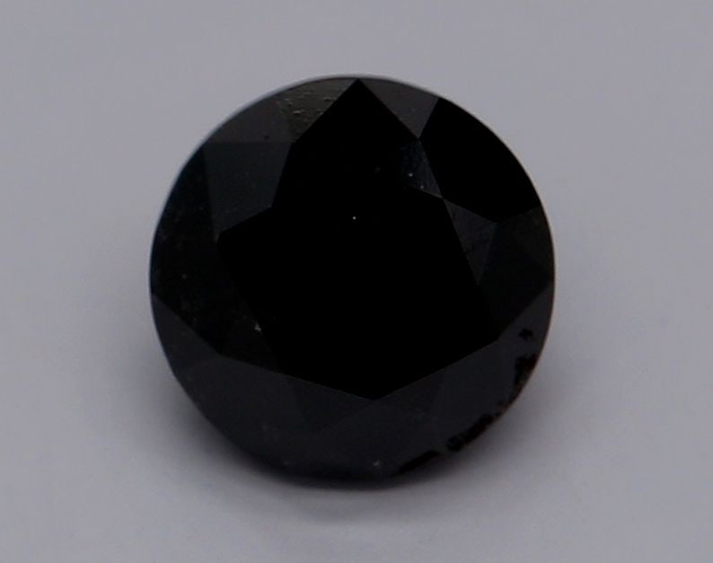 Loose Diamond - ROUND 0.81ct Fancy Black VVS2: Loose Diamond - ROUND 0.81ct Fancy Black VVS2 Source: Natural Shape: ROUND Carats: 0.81 Color: Fancy Black Certification: GIA Video: