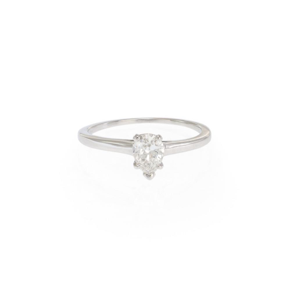 Tiffany & Co. Platinum Solitaire Ring 0.47ct Pear Diamond GIA Cert Size 7: Tiffany & Co. Platinum Solitaire Ring 0.47ct Pear Diamond GIA Cert Size 7 Presenting a stunning Tiffany & Co. solitaire ring, meticulously crafted from platinum and featuring a polished finish. The ri