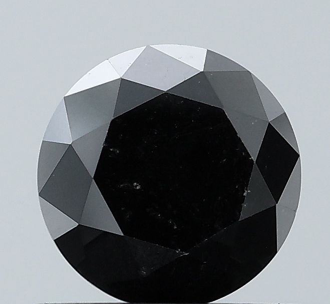 Loose Diamond - ROUND 0.94ct Black VVS2: Loose Diamond - ROUND 0.94ct Black VVS2 Source: Natural Shape: ROUND Carats: 0.94 Color: Black Certification: NONE Video: Video Link The Diamond Depot Guarantee: All items in this auction are