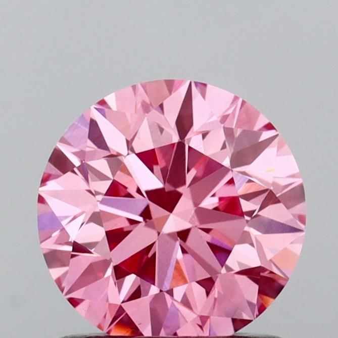 Loose Diamond - ROUND 1.01ct Fancy Vivid Pink VS1: Loose Diamond - ROUND 1.01ct Fancy Vivid Pink VS1 Source: This is a real non-mined Diamond that has been grown in a lab Shape: ROUND Carats: 1.01 Color: Fancy Vivid Pink Certification: IGI Video: