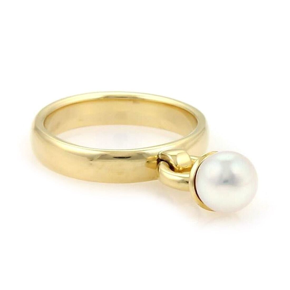 Tiffany & Co Fascination Pearl Drop 18k Yellow Gold Ring Size 6: Tiffany & Co Fascination Pearl Drop 18k Yellow Gold Ring Size 6 This Tiffany & Co. Fascination pearl drop ring features an elegant band crafted in 18k yellow gold. The design is highlighted by a lumin