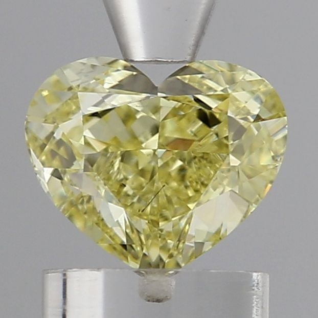Loose Diamond - HEART 1.08ct Fancy Intense Yellow SI1: Loose Diamond - HEART 1.08ct Fancy Intense Yellow SI1 Source: This is a real non-mined Diamond that has been grown in a lab Shape: HEART Carats: 1.08 Color: Fancy Intense Yellow Certification: IGI Vid