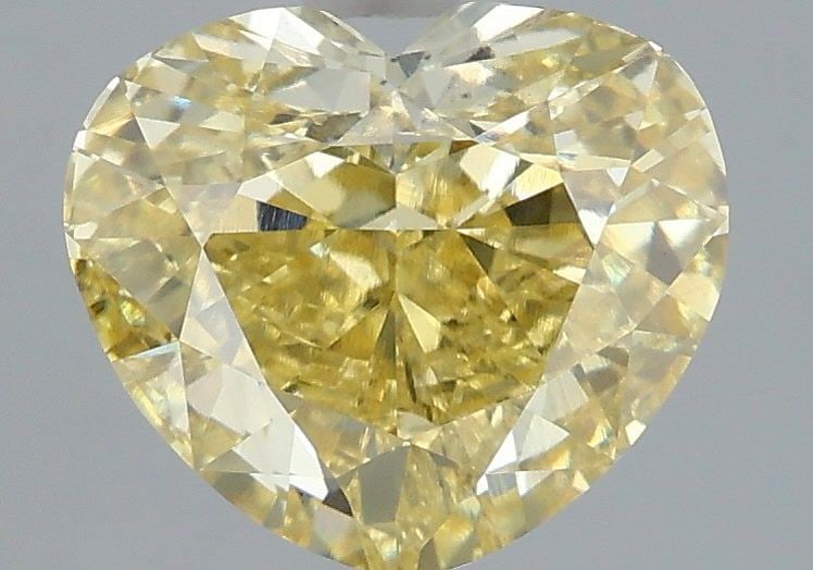 Loose Diamond - HEART 3.01ct Fancy Intense Yellow VS1: Loose Diamond - HEART 3.01ct Fancy Intense Yellow VS1 Source: This is a real non-mined Diamond that has been grown in a lab Shape: HEART Carats: 3.01 Color: Fancy Intense Yellow Certification: IGI Vid