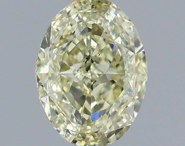 Loose Diamond - OVAL 1.0ct Fancy Light Greenish Yellow SI1: Loose Diamond - OVAL 1.0ct Fancy Light Greenish Yellow SI1 Source: Natural Shape: OVAL Carats: 1.0 Color: Fancy Light Greenish Yellow Certification: GIA Video: