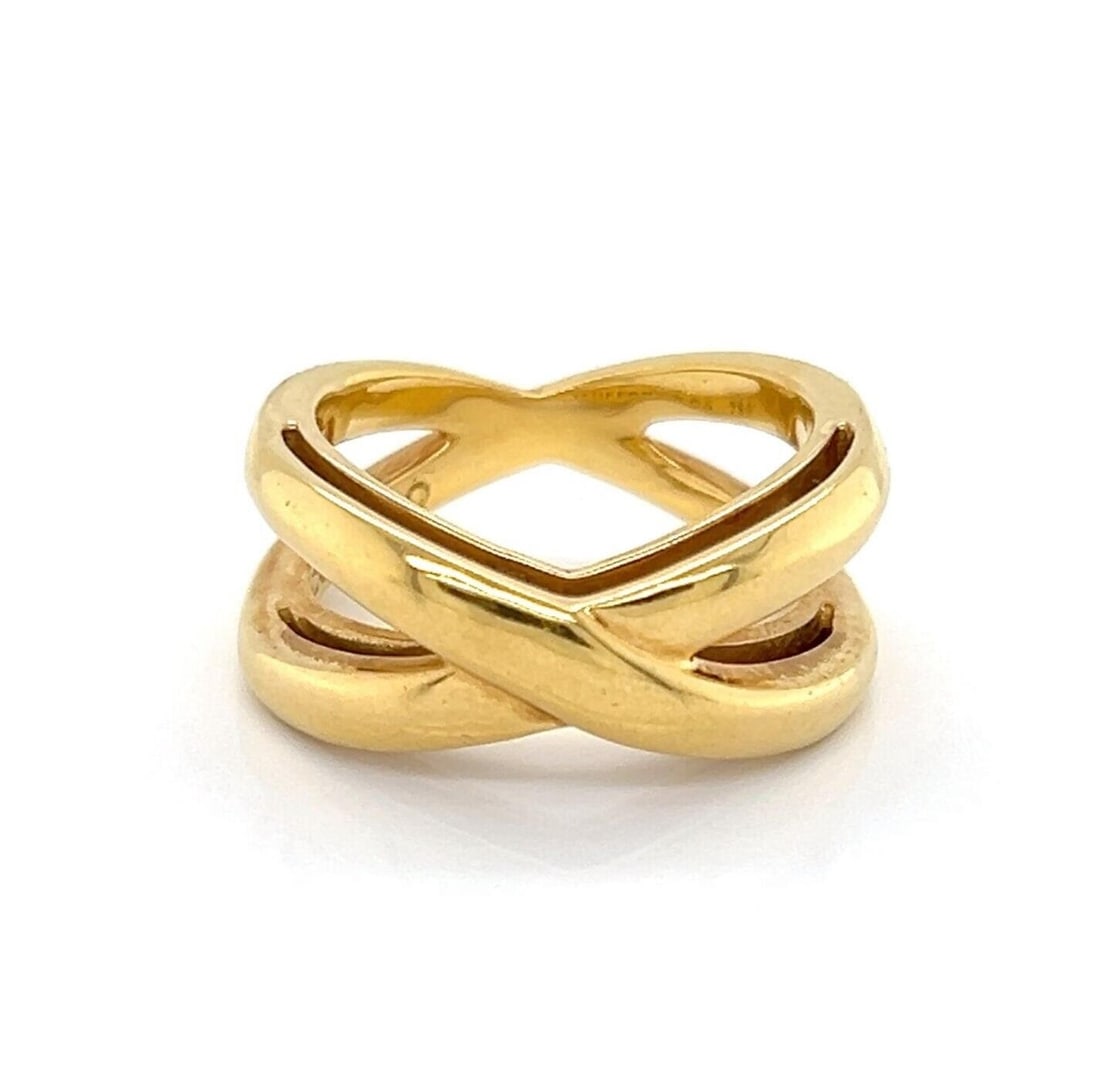 Tiffany Co 18K Yellow Gold Double X Crossover Ring Size 5: Tiffany Co 18K Yellow Gold Double X Crossover Ring Size 5 This Tiffany & Co. Double X Crossover Band Ring is crafted from 18k yellow gold and features a sculptural double X crossover motif. The ring i