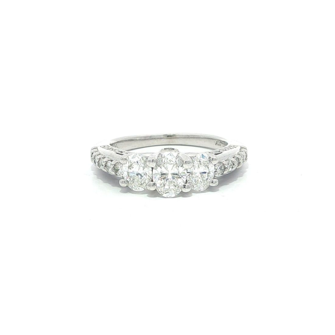 Oval Diamond Trio Engagement Ring in 14k White Gold 1.46 Carat Total Weight: Oval Diamond Trio Engagement Ring in 14k White Gold 1.46 Carat Total Weight This modern engagement or promise ring features three oval cut natural diamonds set in solid 14k white gold. The center and 