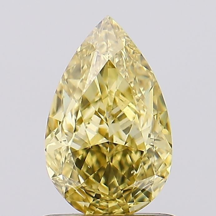 Loose Diamond - PEAR 1.14ct Fancy Vivid Yellow VS1: Loose Diamond - PEAR 1.14ct Fancy Vivid Yellow VS1 Source: This is a real non-mined Diamond that has been grown in a lab Shape: PEAR Carats: 1.14 Color: Fancy Vivid Yellow Certification: IGI Video: