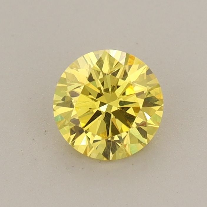 Loose Diamond - ROUND 0.5ct Fancy Vivid Yellow VS1: Loose Diamond - ROUND 0.5ct Fancy Vivid Yellow VS1 Source: This is a real non-mined Diamond that has been grown in a lab Shape: ROUND Carats: 0.5 Color: Fancy Vivid Yellow Certification: IGI Video: