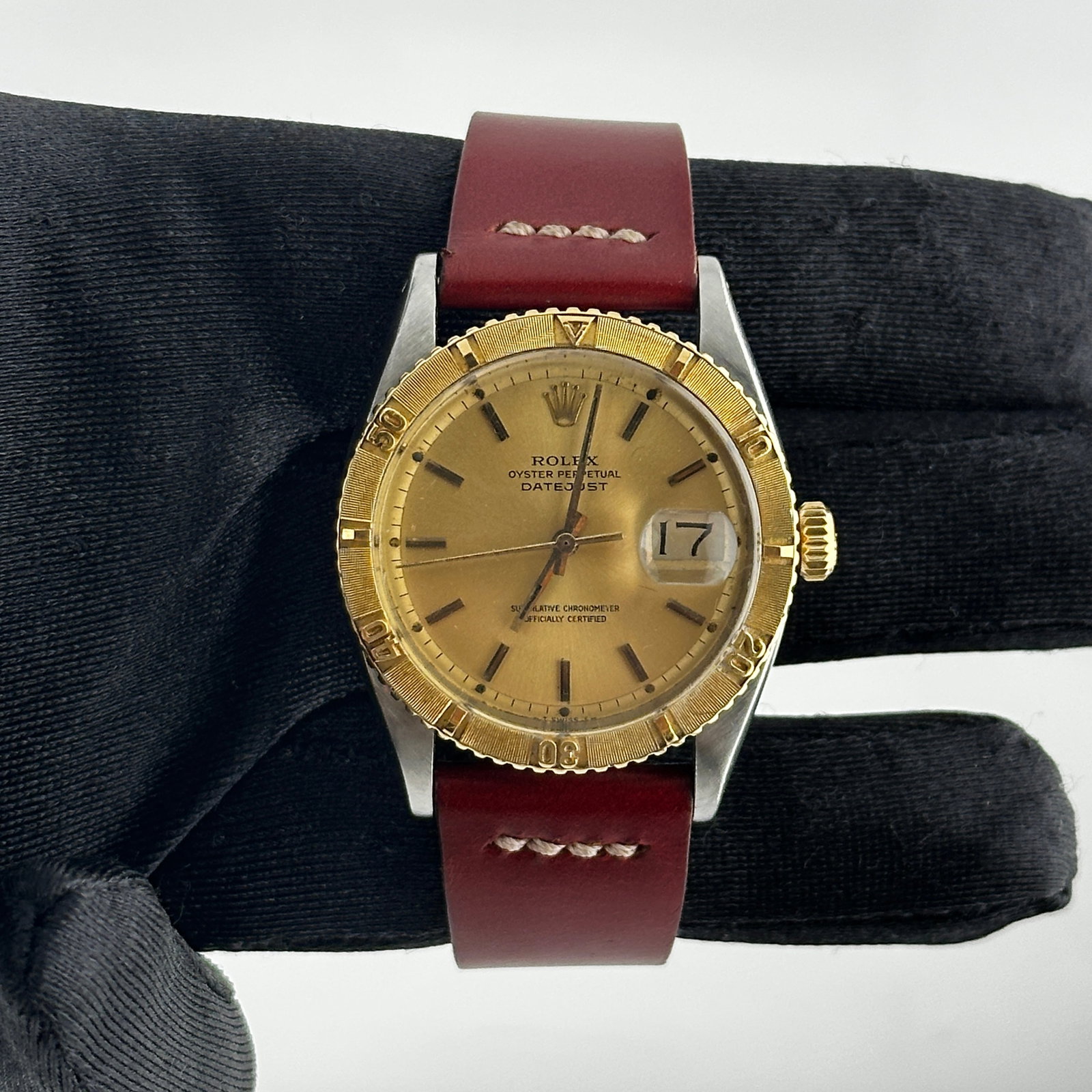 Datejust Turn-o-Graph Ref 6609 Thunderbird Bezel Champagne Dial on Leather Strap: Datejust Turn-o-Graph Ref 6609 Thunderbird Bezel Champagne Dial on Leather Strap This Rolex Datejust Turn-o-Graph features a champagne stick dial and Thunderbird bezel, paired with an aftermarket leat