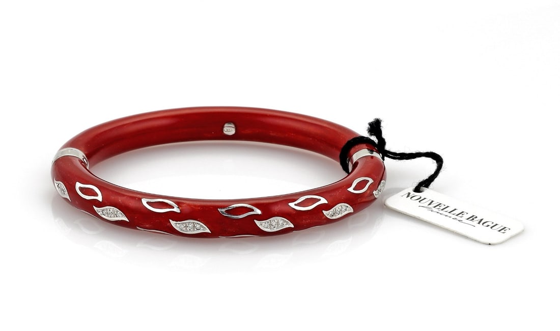 Nouvelle Bague 18k White Gold Sterling Bangle Bracelet Red Enamel Diamonds: Nouvelle Bague 18k White Gold Sterling Bangle Bracelet Red Enamel Diamonds This La Nouvelle Bague bangle bracelet features a sophisticated blend of 18k white gold and sterling silver, highlighted by v