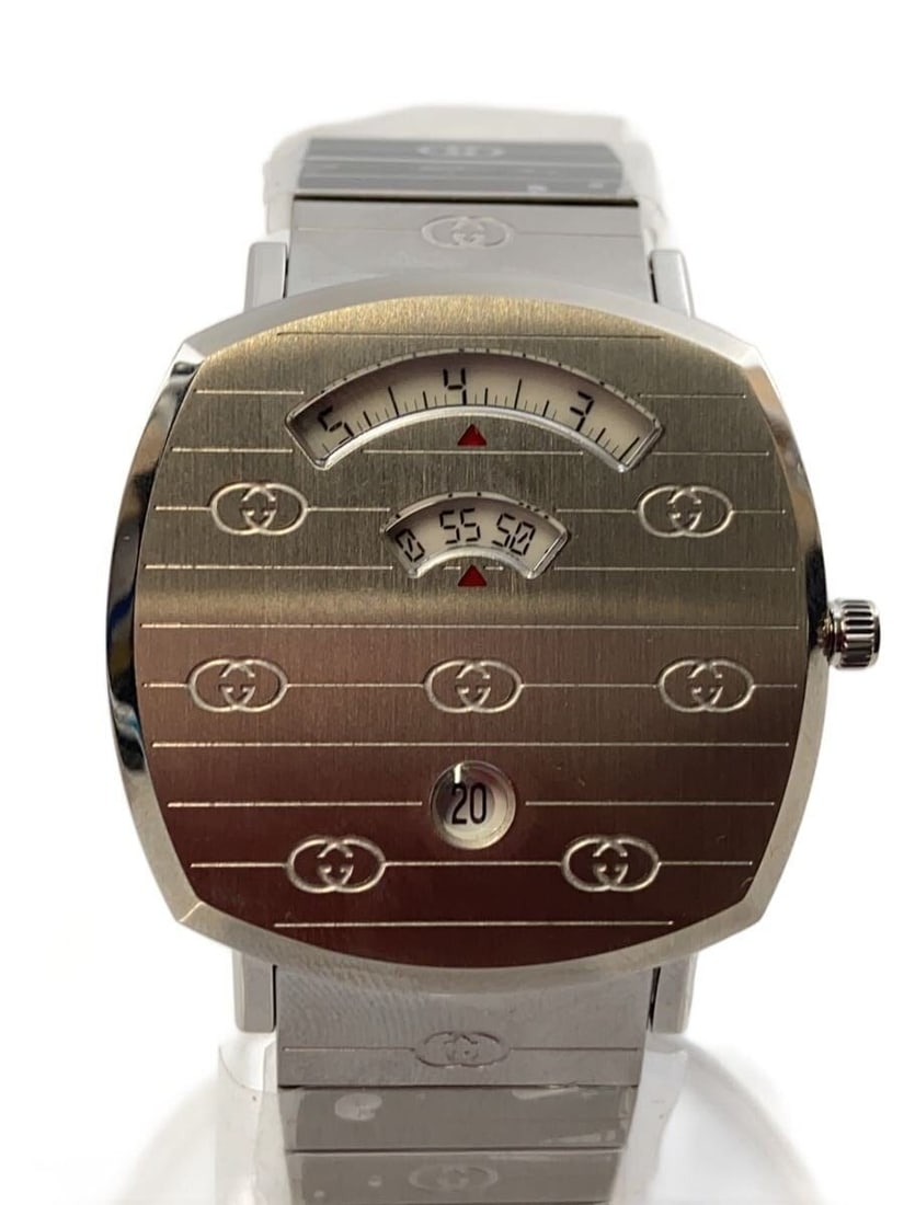 Gucci Grip Quartz Stainless Steel Men's Wristwatch: Gucci Grip Quartz Stainless Steel Men's Wristwatch This is a pre-owned Gucci Grip Quartz 157.4 men's wristwatch featuring a stainless steel case and band. The watch is in very good condition, showing 
