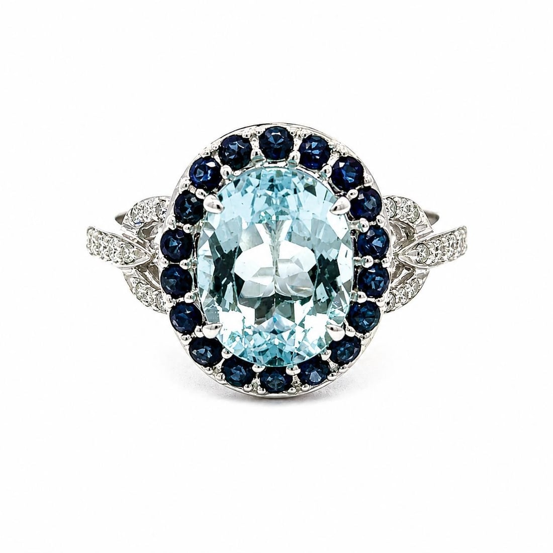 Aquamarine Sapphire Diamond 14k White Gold Cocktail Ring Size 6.5: Aquamarine Sapphire Diamond 14k White Gold Cocktail Ring Size 6.5 This elegant cocktail ring features a natural oval brilliant-cut aquamarine at its center, surrounded by a halo of round brilliant-cut