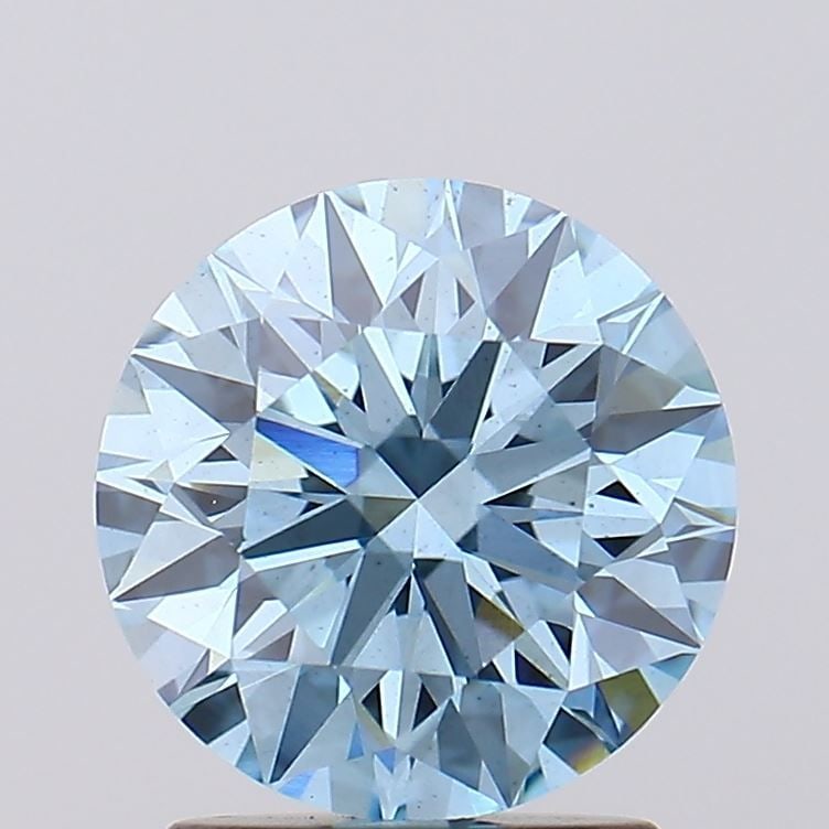 Loose Diamond - ROUND 1.85ct Fancy Vivid Blue VS2: Loose Diamond - ROUND 1.85ct Fancy Vivid Blue VS2 Source: This is a real non-mined Diamond that has been grown in a lab Shape: ROUND Carats: 1.85 Color: Fancy Vivid Blue Certification: IGI Video: