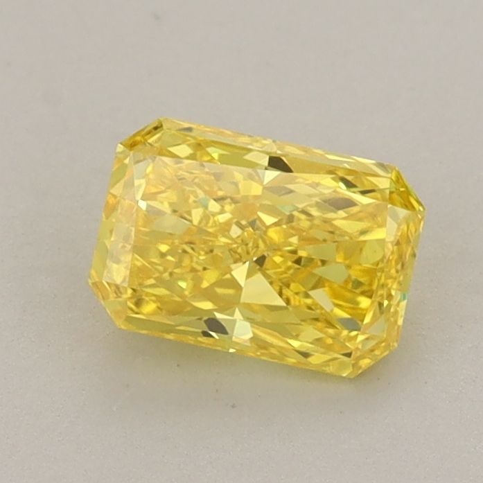 Loose Diamond - RADIANT 0.69ct Fancy Vivid Yellow VVS2: Loose Diamond - RADIANT 0.69ct Fancy Vivid Yellow VVS2 Source: This is a real non-mined Diamond that has been grown in a lab Shape: RADIANT Carats: 0.69 Color: Fancy Vivid Yellow Certification: IGI Vi